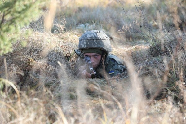 Ukrainian soldiers have to fight Russia and COVID-19 at the same time
