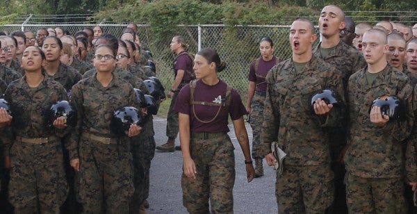 Female recruits training with male counterparts in the first coed boot camp