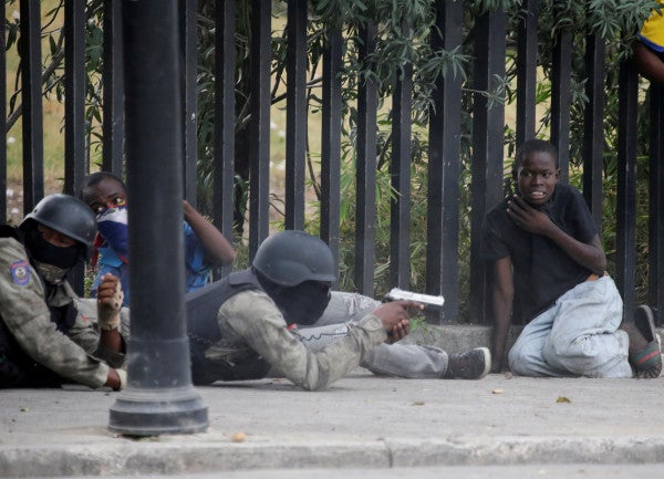 Haiti has an army and a police force. How did they end up shooting at each other?