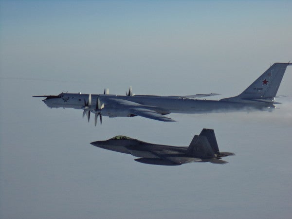 US and Canadian fighter jets intercepted Russian reconnaissance planes as they lurked over a submarine exercise in the Arctic
