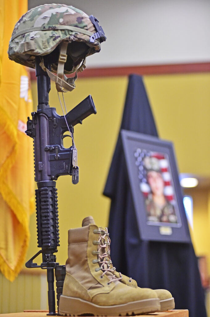 Soldier’s Cross: Spc. Vanessa Guillen’s Soldier’s Cross — including helmet, rifle, identification tags and boots — was the centerpiece inside the Spirit of Fort Hood Chapel at Fort Hood, Texas, July 17. Several hundred people, including her family, gathered for the unit memorial for the fallen Soldier. (U.S. Army photo by Brandy Cruz, Fort Hood Public Affairs)