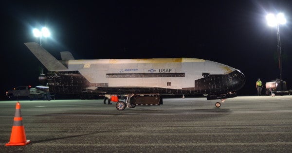 The Air Force’s secretive military space plane lands in Florida after a record-long orbital flight