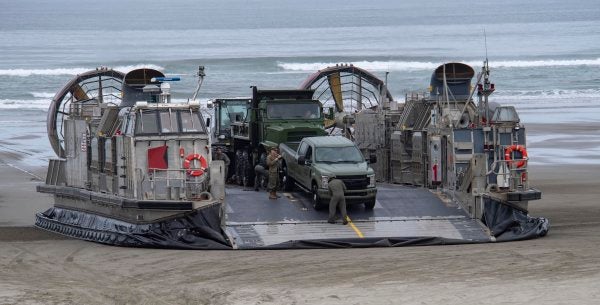 Watch Navy hovercraft storm the beaches of the Pacific Northwest to train for the next catastrophic earthquake