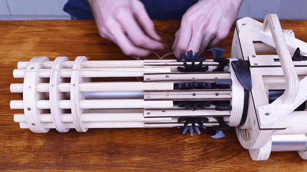 Live your action movie fantasies with this absurd yet fully functional rubber band minigun