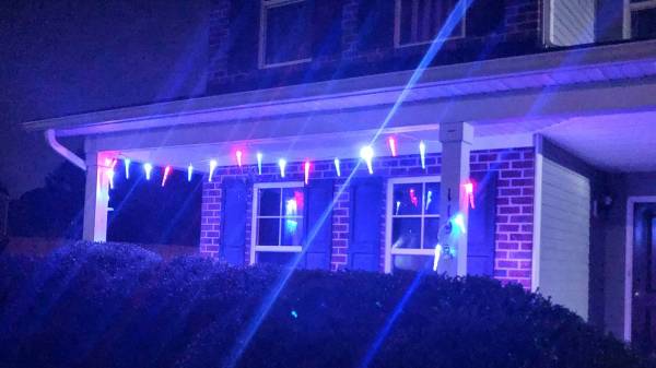 A mother says these patriotic lights honor her soldier son. Her HOA says they’re a violation