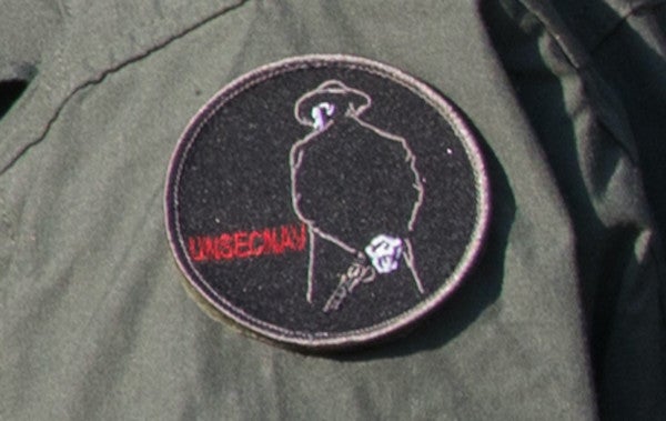 We salute the acting undersecretary of the Navy for rocking a Clint Eastwood patch on his flight suit