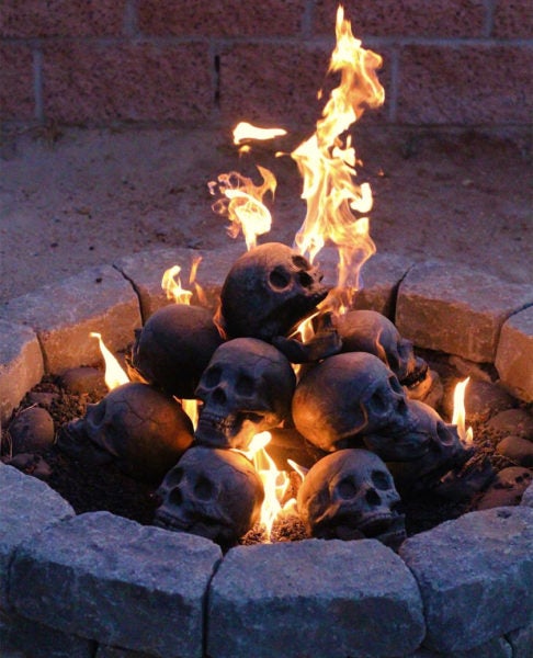 Turn Any Bonfire Into Hellfire With These Metal-As-F*ck Steel Skull Logs