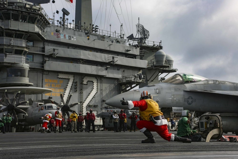 We salute the sailor who walked the flight deck in a Star Wars droid costume