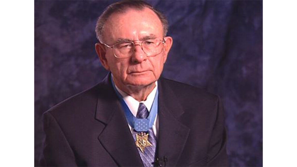 Marine Corps Pfc. Robert Simanek wears his Medal of Honor while discussing his actions in Korea. (Library of Congress video still)