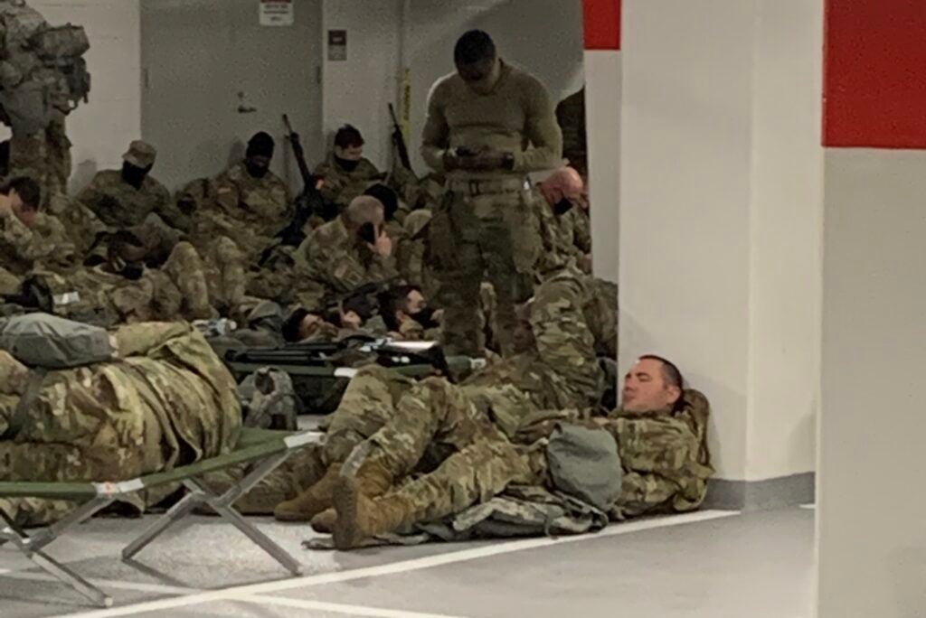 National Guardsmen take a breather in the congressional parking garages. (Task & Purpose)