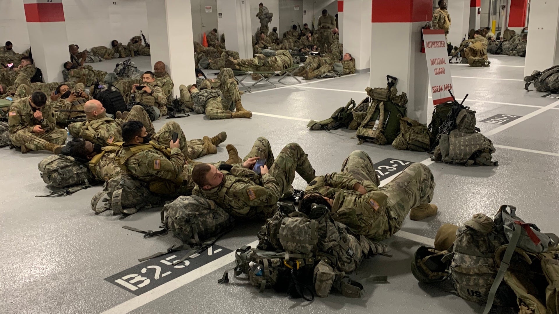 National Guardsmen sleep in parking garages following Biden inauguration