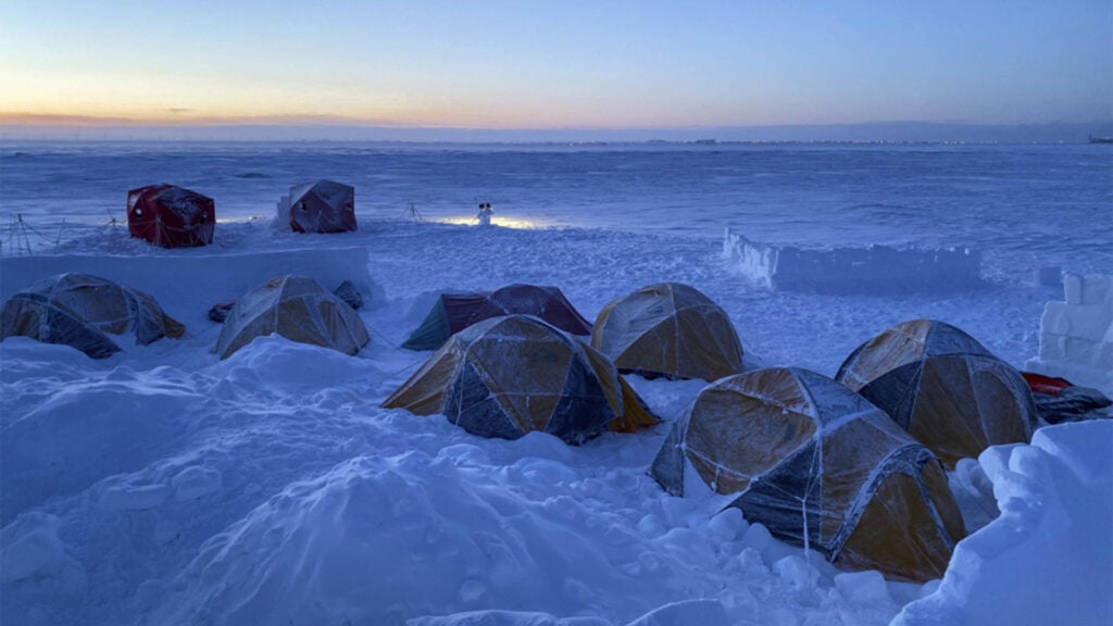 Survival, evasion, resistance and escape (SERE) specialists going through upgrade training stay over in tents at Utqiaġvik (Barrow), Alaska, Jan. 13, 2021. Prior to training in an arctic environment, the SERE students trained in coastal, desert and tropical biomes across the world. (Air Force photo / Master Sgt. Ryan M. Dewey)