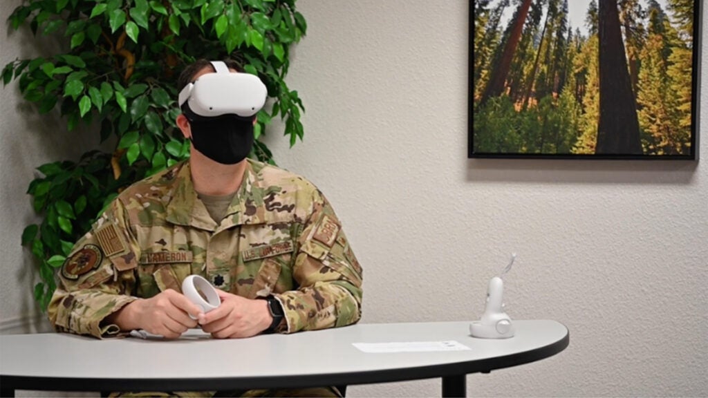 Lt. Col. Glenn Cameron, 60th Civil Engineer Squadron commander, participates in a test-virtual reality program, at Travis Air Force Base, California, Feb. 18, 2021. The resiliency program is being tested at Scott and Travis AFBs and is the only training across the Department of Defense of its kind. (Screenshot of Air Force video by Nicholas Pilch)