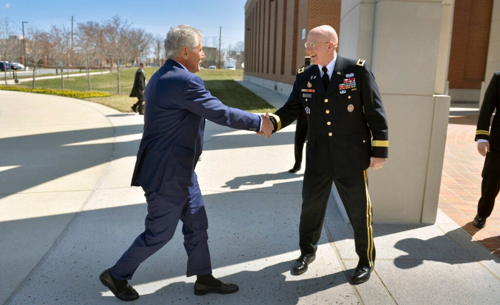 National Defense University President Maj. Gen. Gregg F. Martin, U.S. Army, welcomes Secretary of Defense Chuck Hagel as he arrives at Fort McNair in Washington, D.C., April 3, 2013. Hagel will address an audience of roughly 600 faculty, students and guests on the strategic and fiscal challenges facing the Department of Defense. (DOD photo By Glenn Fawcett)