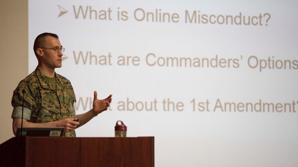 Maj. Eldon Beck speaks on First Amendment rights during a Social Media Misconduct Symposium at Breckenridge Auditorium, Marine Corps War College, Marine Corps Base Quantico, Mar. 30, 2017. 



(U.S. Marine Corps photo by Cpl. Dana Beesley)