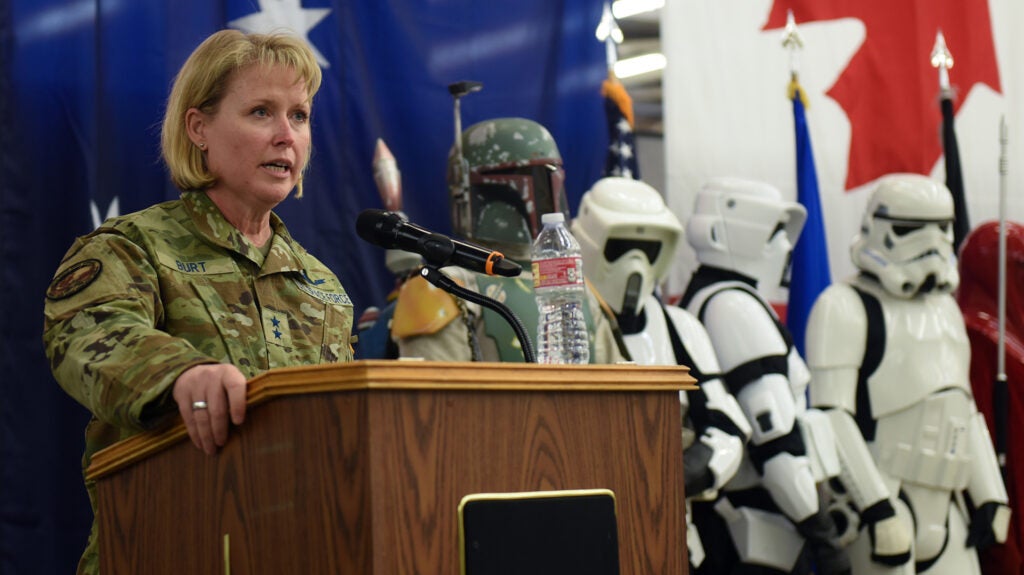 Maj. Gen. DeAnna Burt, Combined Force Space Component Command commander, addresses attendees of the International Space Day celebration, where she was also officially sworn-in to the U.S. Space Force, May 7, 2021, Vandenberg Air Force Base, Calif. The lunchtime event for CSpOC and Combined Force Space Component Command (CFSCC) personnel included opening remarks from CSpOC/Space Delta 5 commander Col. Monique DeLauter, a rocket design and launch competition, and a cornhole tournament, followed by a brief transfer-of-service ceremony for the CFSCC commander Maj. Gen. DeAnna Burt. (U.S. Space Force photo by Michael Peterson)