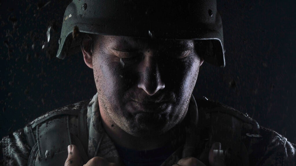 Retired U.S. Air Force Staff Sgt. Clifton Flint, formerly 48th Security Forces Squadron base defense operations center controller, poses for a photo to represent post-traumatic stress disorder June 30, 2017, on RAF Mildenhall, England. June is National PTSD Awareness Month. Flint suffers from post-traumatic stress disorder, brought on after sustaining a traumatic brain injury while deployed to Iraq in 2005. (U.S. Air Force photo by Staff Sgt. Micaiah Anthony)