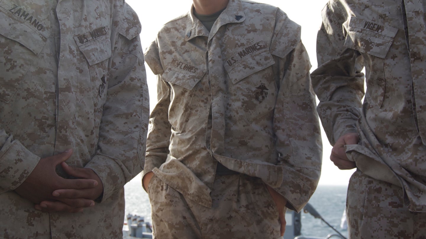 Three corporals of the United States Marine Corps wearing the desert version of the Marine Corps Combat Utility Uniform (MCCUU) in May 2009. (U.S. Marine Corps photo)