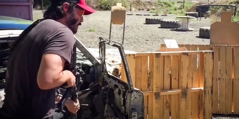 Watch Keanu Reeves destroy this gun range
