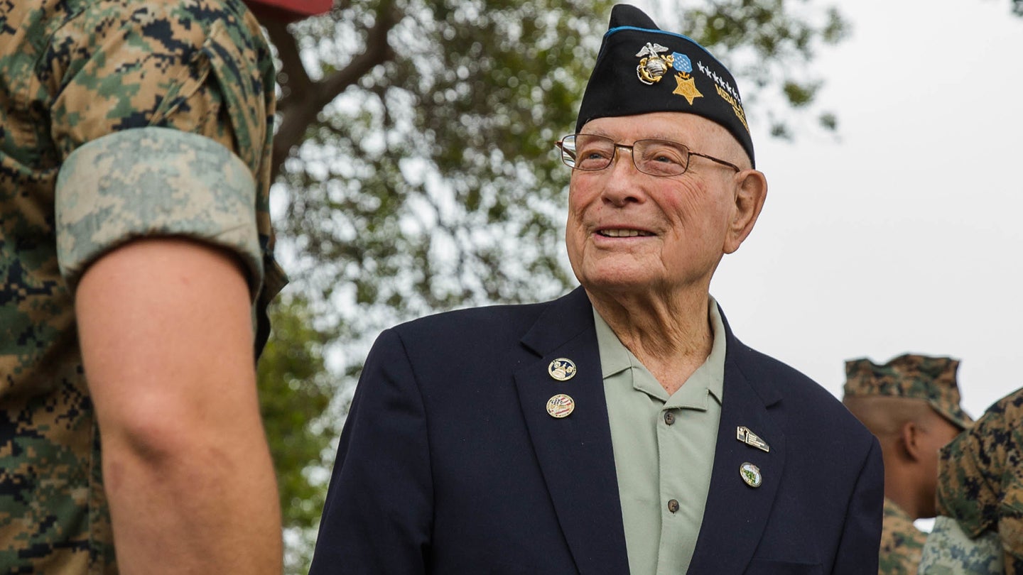 Retired U.S. Marine Corps Chief Warrant Officer 4 Hershel “Woody” Williams, the last surviving Medal of Honor recipient of the battle of Iwo Jima, right, greets Marines during his visit to the 5th Marine Regiment Vietnam War Memorial at Marine Corps Base Camp Pendleton, Calif., May 29, 2018. (Lance Cpl. Alexa M. Hernandez/U.S. Marine Corps)