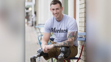 Nine years after losing both legs in Afghanistan, he's found purpose in family, friends and inspiring others