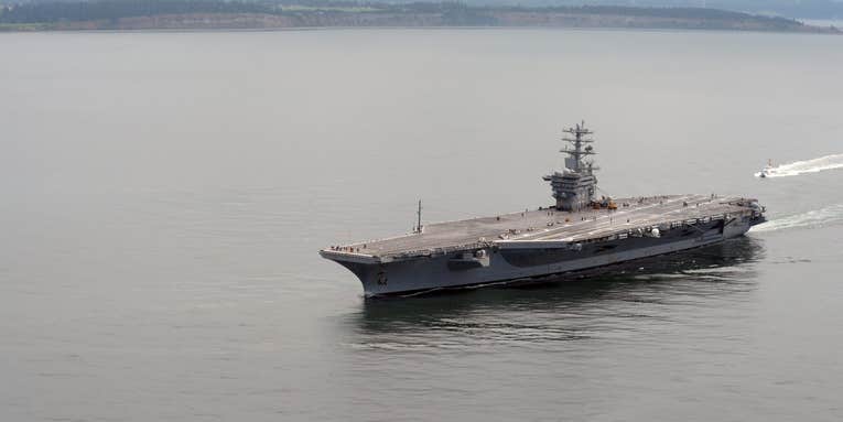 Search and rescue underway for missing sailor on USS Nimitz