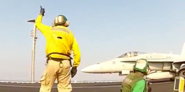 Hilarious Video Shows Navy Carrier Officers Having Way Too Much Fun Launching Aircraft