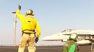 Hilarious Video Shows Navy Carrier Officers Having Way Too Much Fun Launching Aircraft