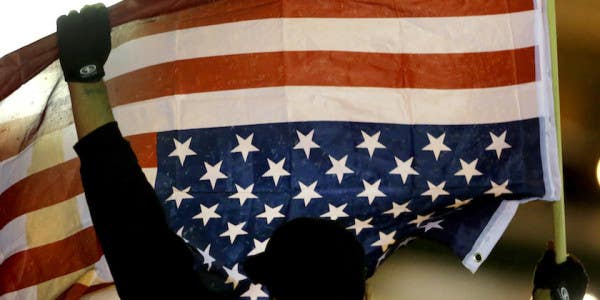 Army Vet Arrested For Hanging US Flag Upside Down. But Did He Commit A Crime?