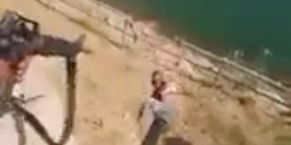 Video Appears To Show Iraqi Soldiers Throwing A Suspected ISIS Militant Off A Building