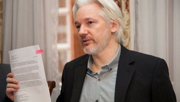 Julian Assange sentenced to 50 weeks in British jail for skipping bail