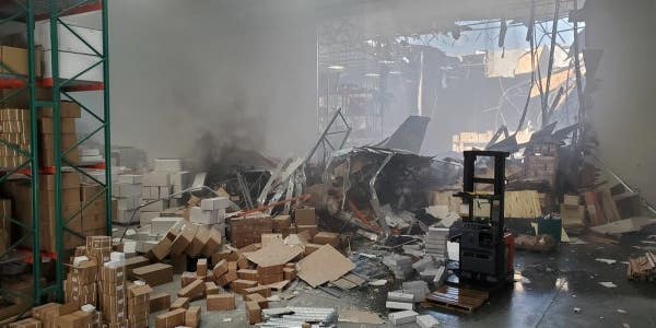 An F-16 fighter jet crashed into a warehouse in Southern California
