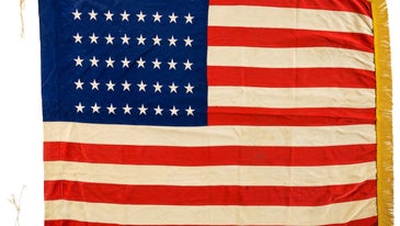 You can now own a battle-scarred American flag that US troops planted on Omaha Beach on D-Day