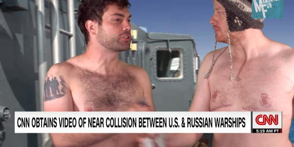 Shirtless Russian sailors casually sunbathe while their ship almost collides with US missile cruiser