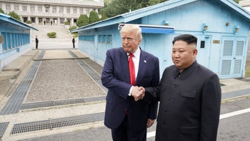 Trump shakes hands with Kim Jong Un in historic meeting at Korean DMZ