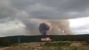 Watch an explosion at a Russian arms depot in Siberia create a massive shockwave