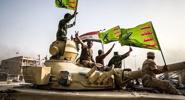 Iraqi paramilitary groups blame US, Israel for blasts at militia bases
