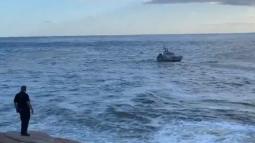 Coast Guard rescues 13-year-old boy who was swept 'several hundred feet' out to sea from Massachusetts' coast