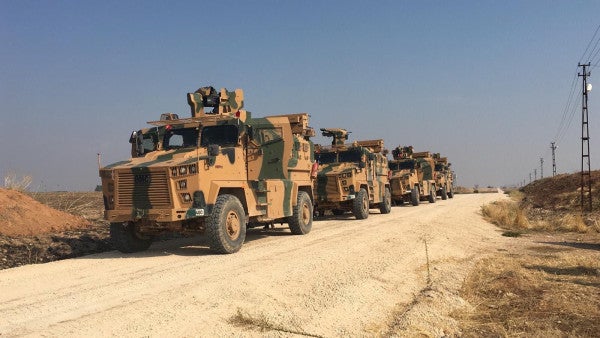 Turkey and Russia hold first joint patrol in northeast Syria