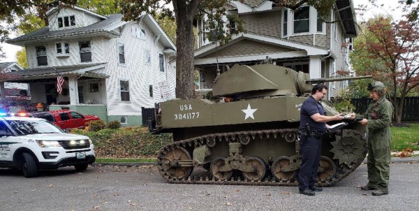Here’s a photo of a police officer pulling over a tank