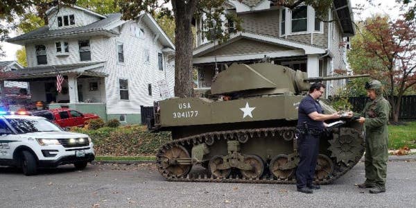 Here’s a photo of a police officer pulling over a tank