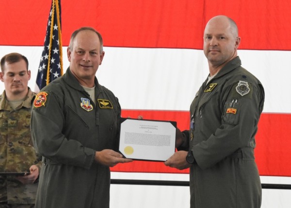 Two A-10 pilots receive the Distinguished Flying Cross for rescuing troops under heavy fire in Afghanistan