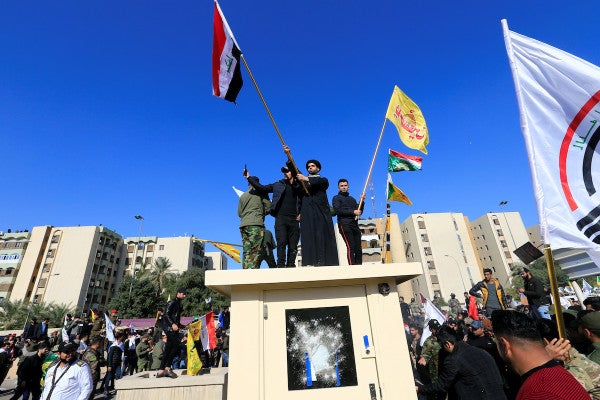 Protesters attempt to storm US embassy in Baghdad over US air strikes
