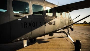 4 Iraqis wounded in attack on military base that houses US forces