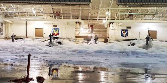 Yes, this is a helicopter hangar filled with foam, and no, this definitely wasn’t supposed to happen