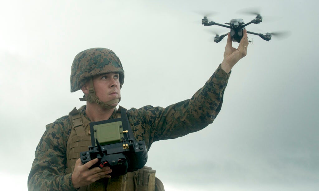 Lance Cpl. Brian A. Fentresstaglisferi, an intelligence specialist with Battalion Landing Team, 1st Battalion, 4th Marines, launches an InstantEye quadcopter during embassy reinforcement training at Camp Hansen, Okinawa, Japan, Dec. 5, 2018. Drone surveillance allows Marines to gain an unparalleled view of tactical environments and minimize exposure to possible threats on battlefields. The 31st Marine Expeditionary Unit is currently honing its planning capabilities during MEU Exercise, the first step of a pre-deployment training cycle designed to integrate the separate components of the 31st MEU into a cohesive crisis response force. Fentresstaglisferi, a native of Summerville, South Carolina graduated Cane Bay High School in June 2017, before enlisting in June 2017. The 31st MEU, the Marine Corps’ only continuously forward-deployed MEU, provides a flexible force ready to perform a wide-range of military operations in the Indo-Pacific region.  (U.S. Marine Corps photo by Lance Cpl. Tanner D. Lambert/Released)