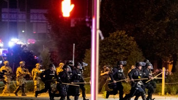 One dead in Louisville after shooting involving police and National Guard amid protests