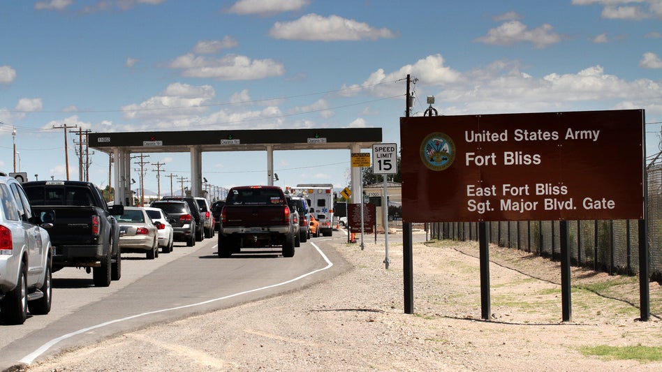 Cars wait to enter Fort Bliss in El Paso, Texas, in 2014. 