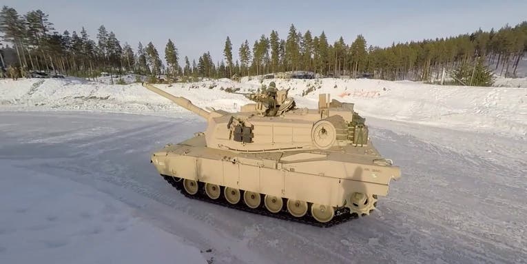 Marine Corps tanks slip on the ice in Norway