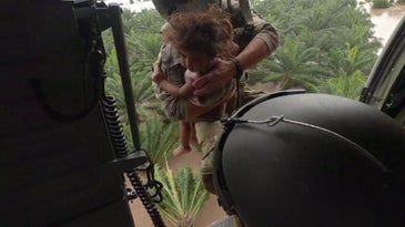 Black Hawk crew rescues a Honduran child from hurricane floodwaters